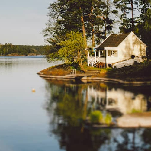 Lake house image, likely showcasing a house near a lake or waterfront property.